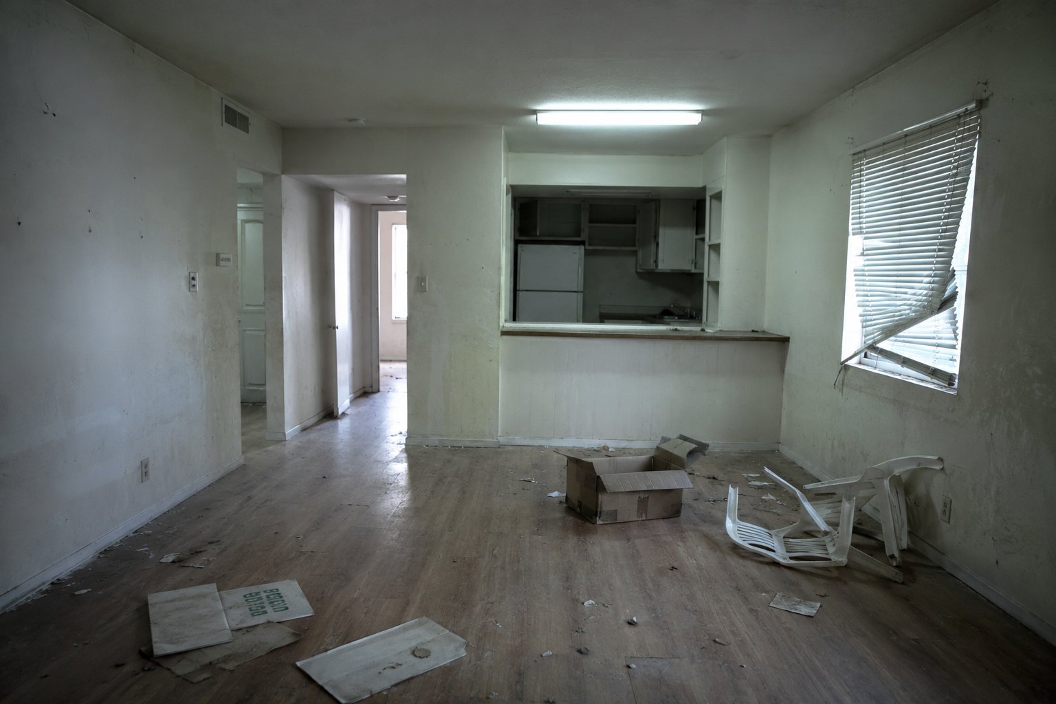 Hamilton apartment turnover &mdash; before: distressed vacancy with worn finishes