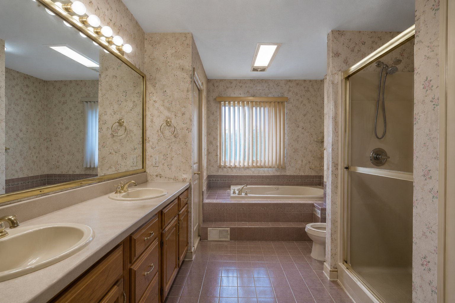 Hamilton bathroom renovation &mdash; before: outdated fixtures and finishes